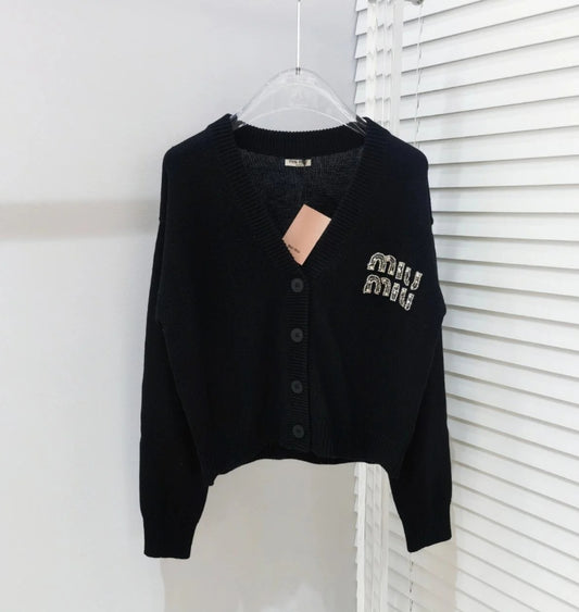 Knitted cardigan with rhinestone logo