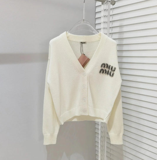 Knitted cardigan with rhinestone logo